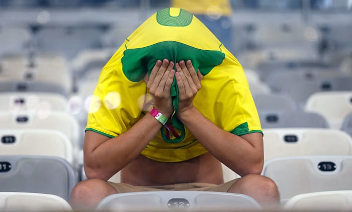 sad-brazil-fan-4f583494f7ff40e0a647df4c91fa071c-0.jpg